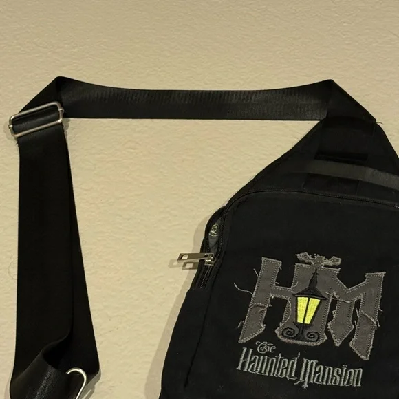 Disney Black Haunted Mansion Sling Backpack with Yellow Lantern - Picture 3 of 5
